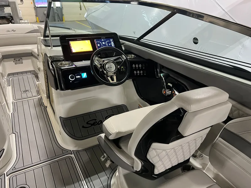 Slide: The Image of 2024 Sea Ray SLX 260 Outboard with anchor on trailer. - 5