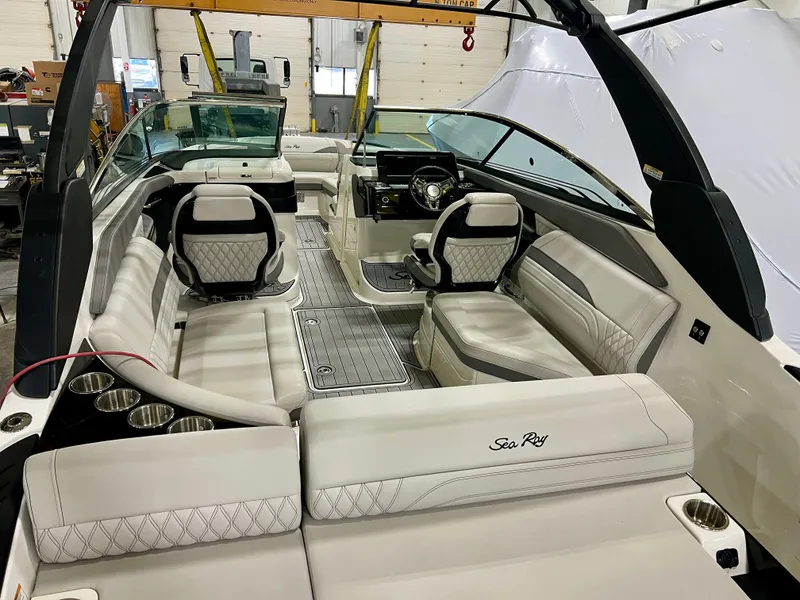 Slide: The Image of 2024 Sea Ray SLX 260 Outboard with luxurious interior design. - 6