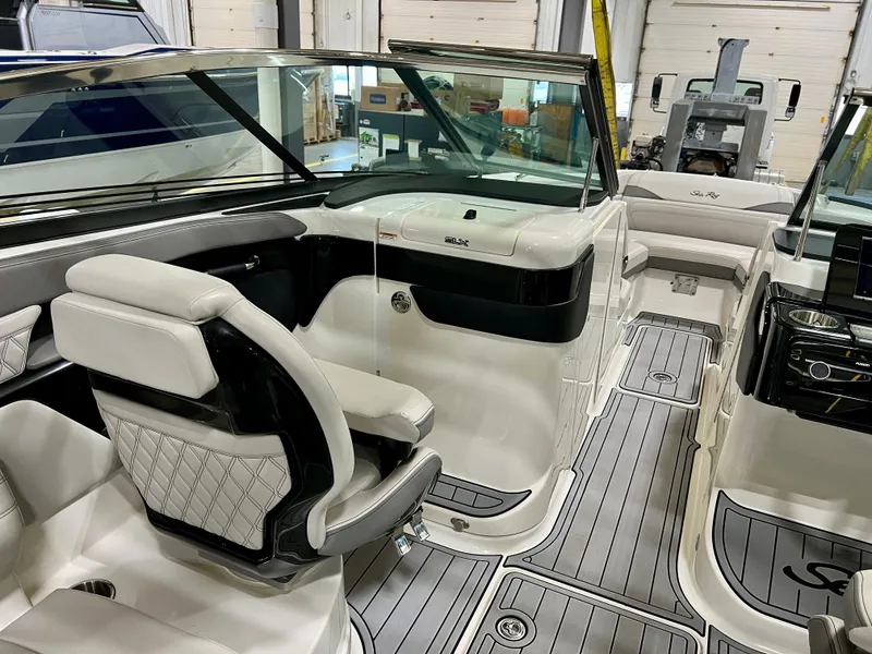 Slide: The Image of Interior of 2024 Sea Ray SLX 260 Outboard with luxurious seating. - 8