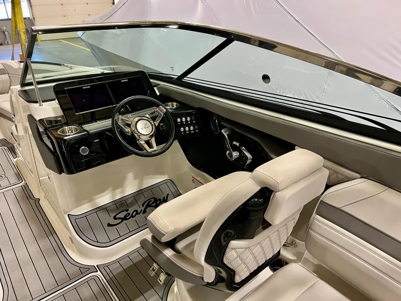 Slide: The Image of Interior of 2024 Sea Ray SLX 260 Outboard with luxurious seating. - 9