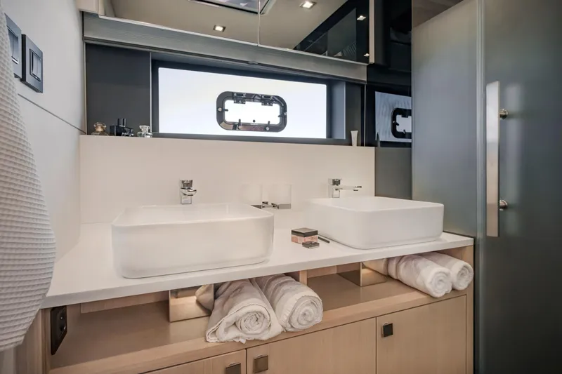 Slide: The Image of Luxury bathroom in 2025 Privilege Signature 650 yacht with dual sinks and modern design. - 33