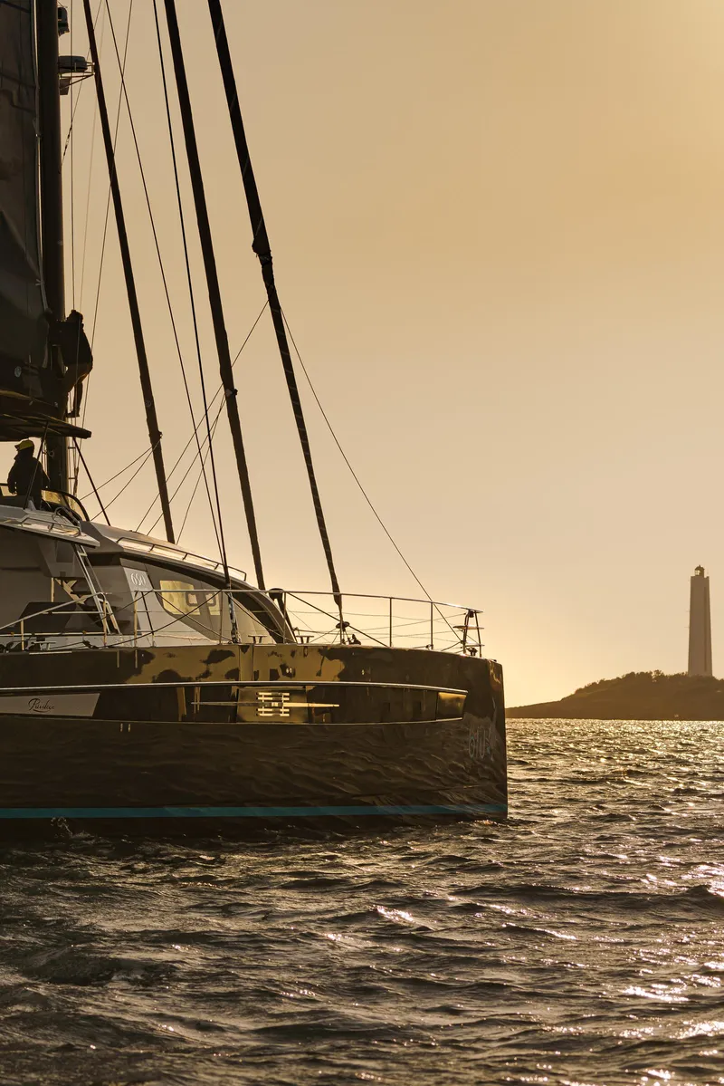 Slide: The Image of Luxury Privilege Signature 650 yacht sailing at sunset near a lighthouse, 2025 model. - 44