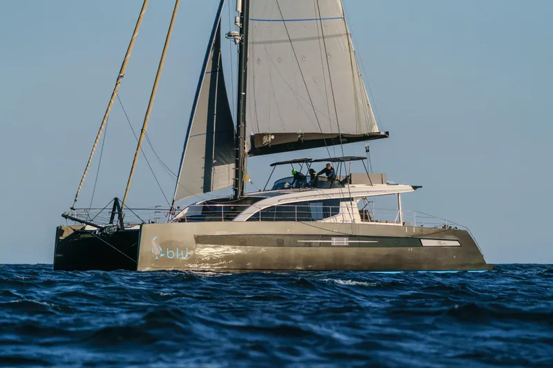 Slide: The Image of Luxury Privilege Signature 650 catamaran sailing on open sea, 2025 model. - 3