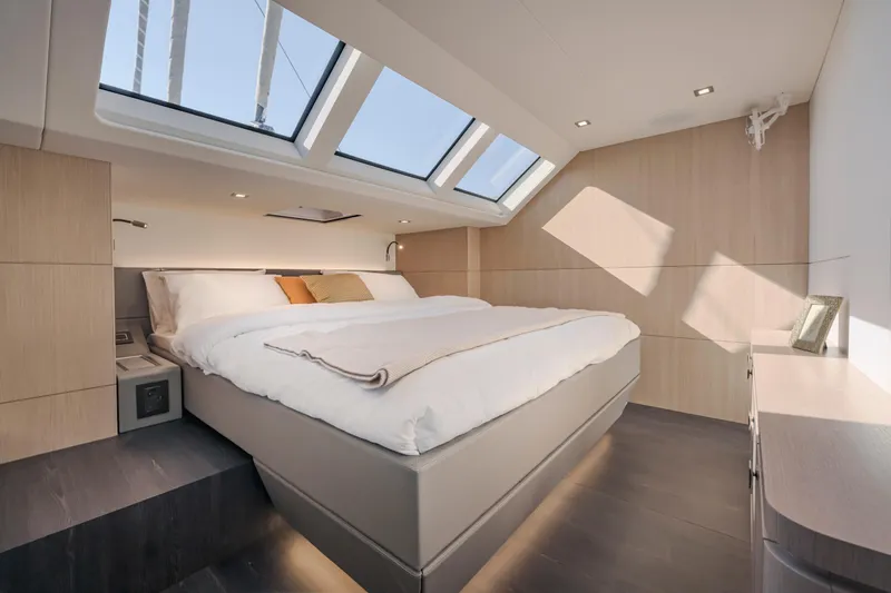Slide: The Image of Luxurious bedroom in 2025 Privilege Signature 650 yacht with skylights and modern design. - 30