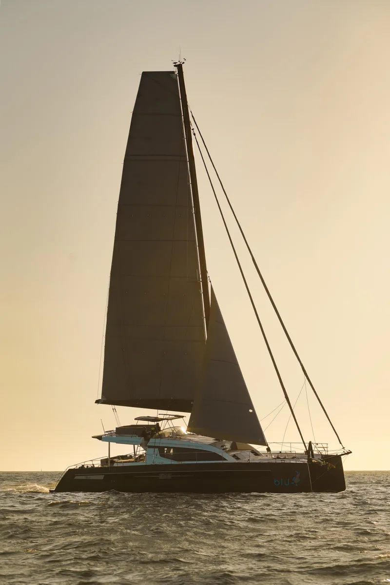 Slide: The Image of Luxury Privilege Signature 650 catamaran sailing at sunset, 2025 model. - 42