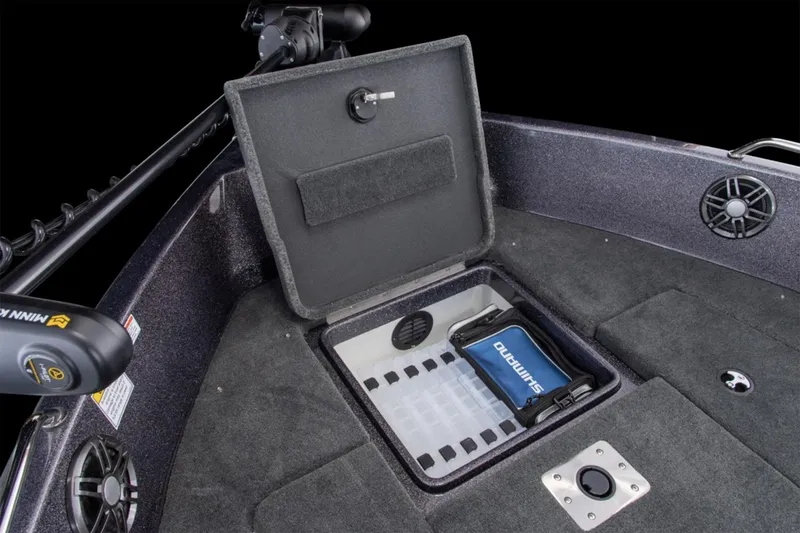 Slide: The Image of Manufacturer Provided Image: 2026 Skeeter Solera 205 boat storage compartment with Shimano tackle box. - 11