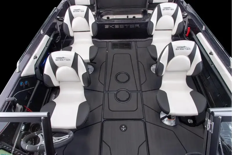 Slide: The Image of Manufacturer Provided Image: 2026 Skeeter Solera 205 boat interior with four white and black seats, sleek design. - 15