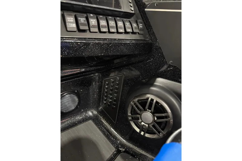 Slide: The Image of 2026 Skeeter Solera 205 dashboard with control panel and speaker. - 3