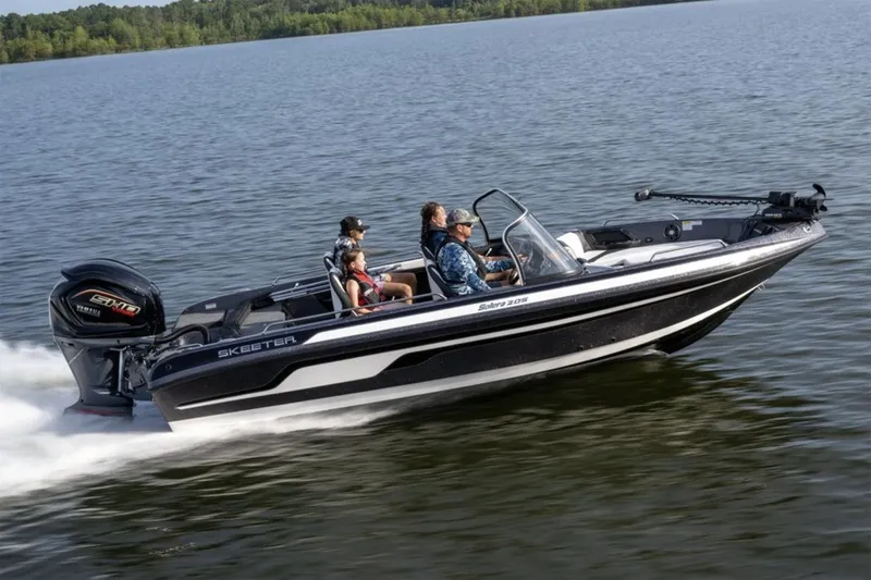 Slide: The Image of Manufacturer Provided Image: 2026 Skeeter Solera 205 boat cruising on a lake with passengers onboard. - 9