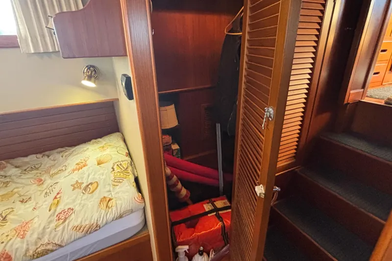 Slide: The Image of Cozy cabin interior of 1989 Grand Banks 46 Classic with bed and closet. - 114