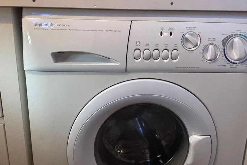 Slide: The Image of Splendide 2000 S washer-dryer unit on 1989 Grand Banks 46 Classic yacht. - 124