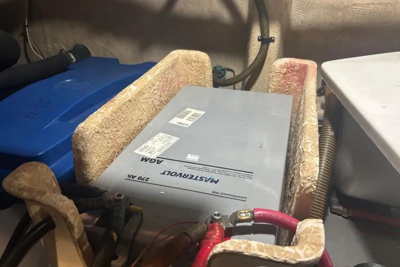 Slide: The Image of Battery compartment of 1989 Grand Banks 46 Classic boat with AGM battery. - 146