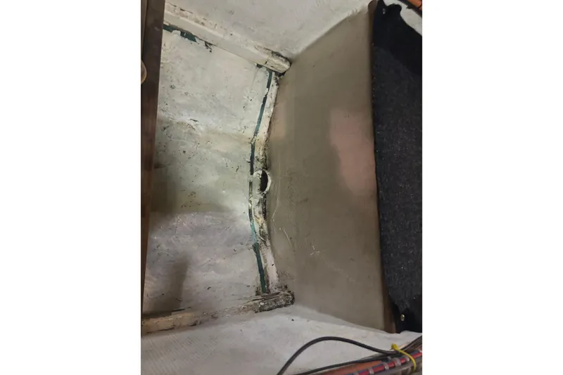 Slide: The Image of Interior view of 1989 Grand Banks 46 Classic boat, showing a storage compartment. - 149