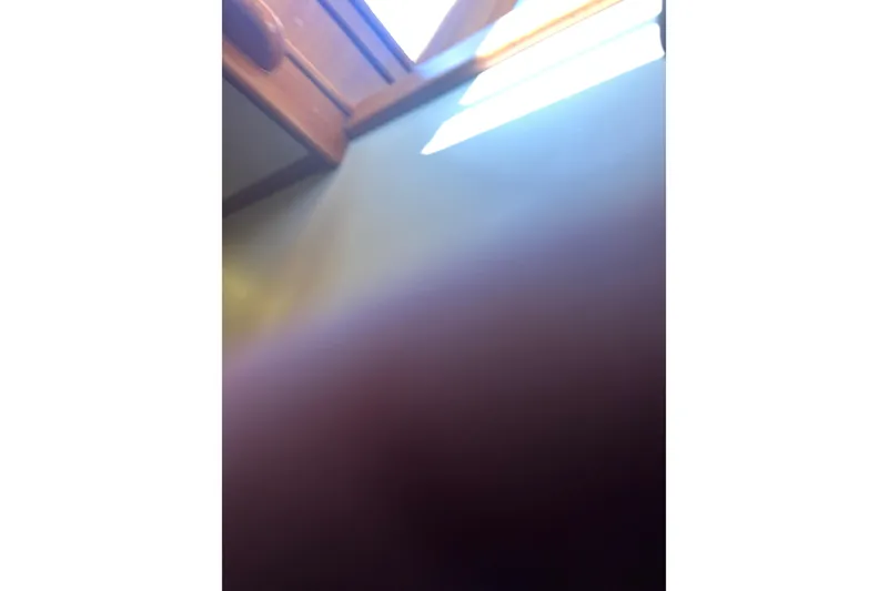 Slide: The Image of Blurry interior view of a 1989 Grand Banks 46 Classic yacht. - 155