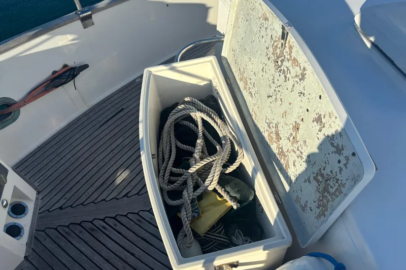 Slide: The Image of Open storage compartment on 1989 Grand Banks 46 Classic boat with ropes inside. - 32