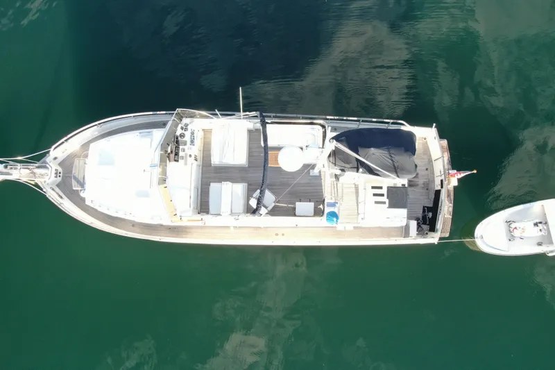Slide: The Image of Aerial view of 1989 Grand Banks 46 Classic yacht on calm water. - 6