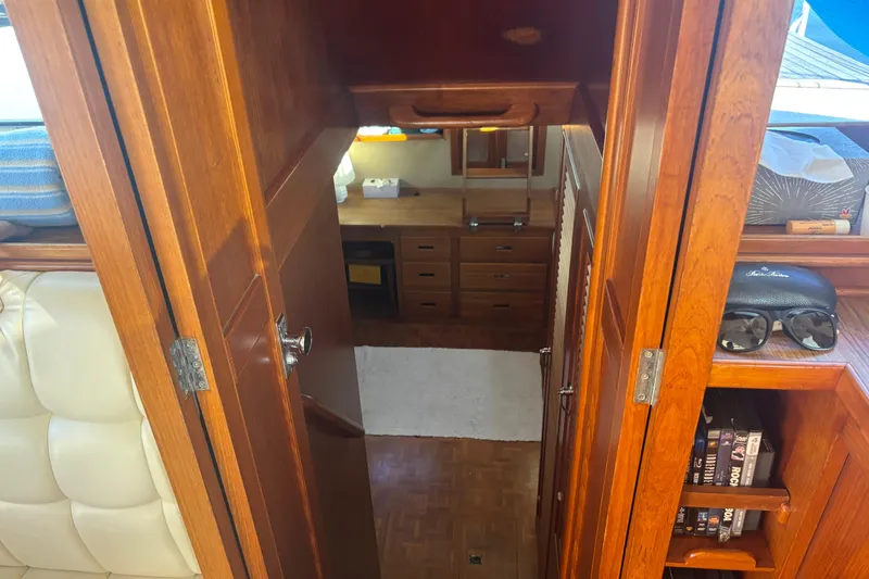 Slide: The Image of Interior view of 1989 Grand Banks 46 Classic yacht with wooden cabinetry and cozy furnishings. - 98