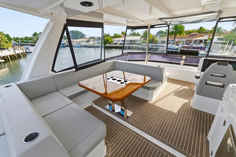 Slide: The Image of Luxurious interior of 2023 Leopard 46 Powercat yacht with spacious seating and elegant table. - 21