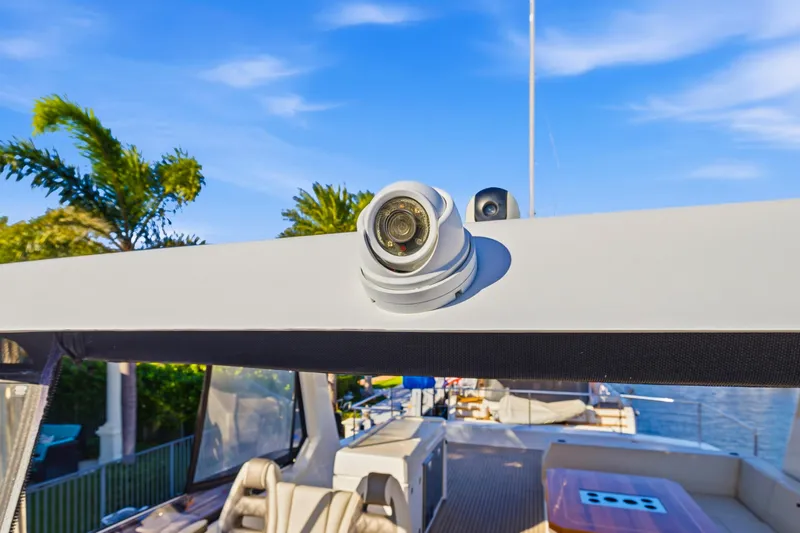 Slide: The Image of 2023 Leopard 46 Powercat yacht with camera, tropical setting, blue sky. - 30
