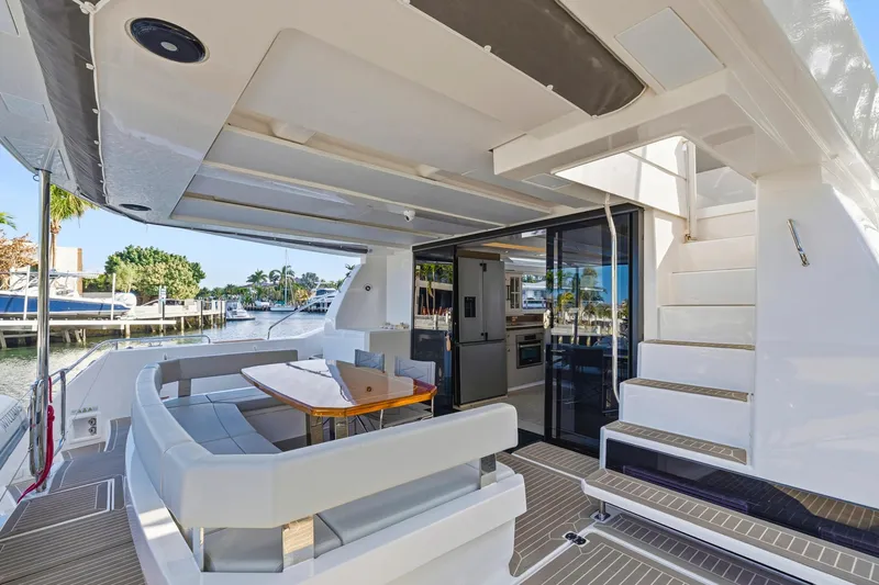 Slide: The Image of 2023 Leopard 46 Powercat yacht with spacious outdoor seating and modern interior design. - 36