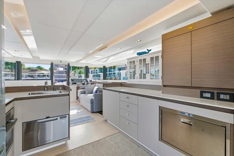 Slide: The Image of Luxurious interior of 2023 Leopard 46 Powercat yacht with modern kitchen and seating area. - 40