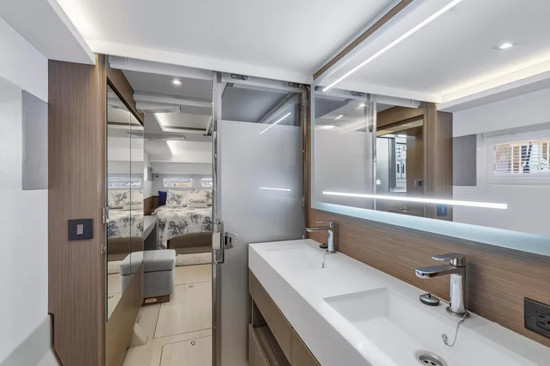 Slide: The Image of Luxurious interior of 2023 Leopard 46 Powercat yacht featuring modern bathroom and bedroom. - 51