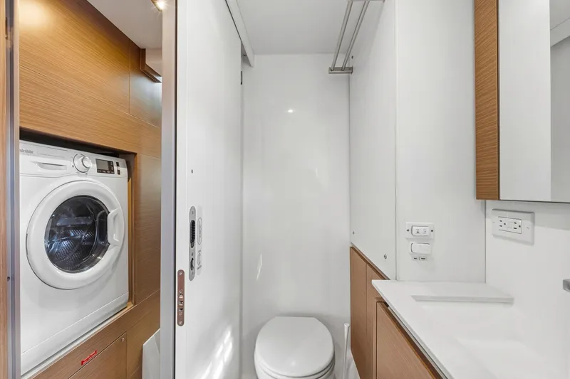Slide: The Image of Laundry and bathroom area in 2023 Leopard 46 Powercat yacht, featuring modern amenities. - 57