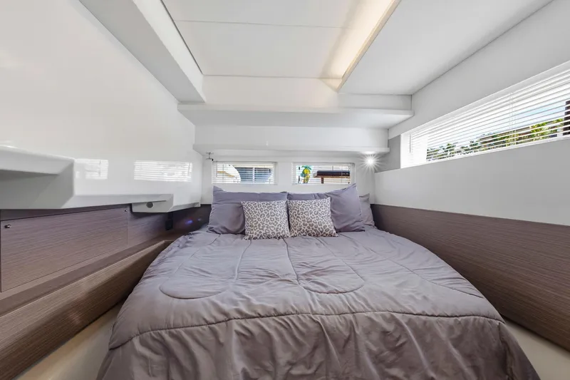 Slide: The Image of Luxurious bedroom interior of 2023 Leopard 46 Powercat yacht with modern design and cozy bedding. - 62