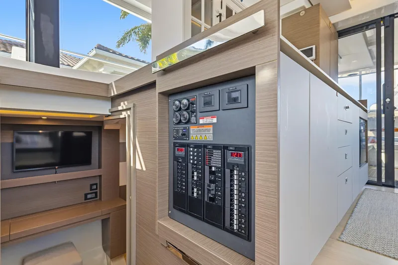 Slide: The Image of 2023 Leopard 46 Powercat interior with control panel and modern design elements. - 63