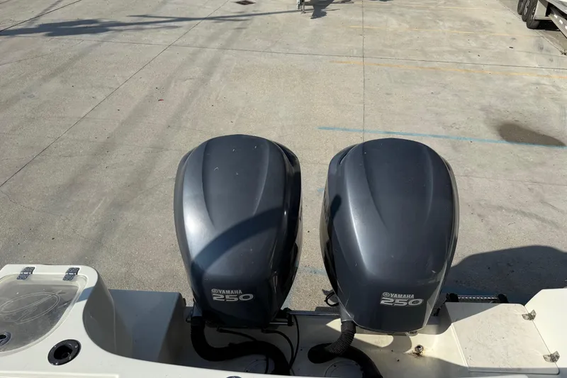 Slide: The Image of Twin Yamaha 250 outboard engines on a 2007 Sailfish 2660 CC boat. - 16
