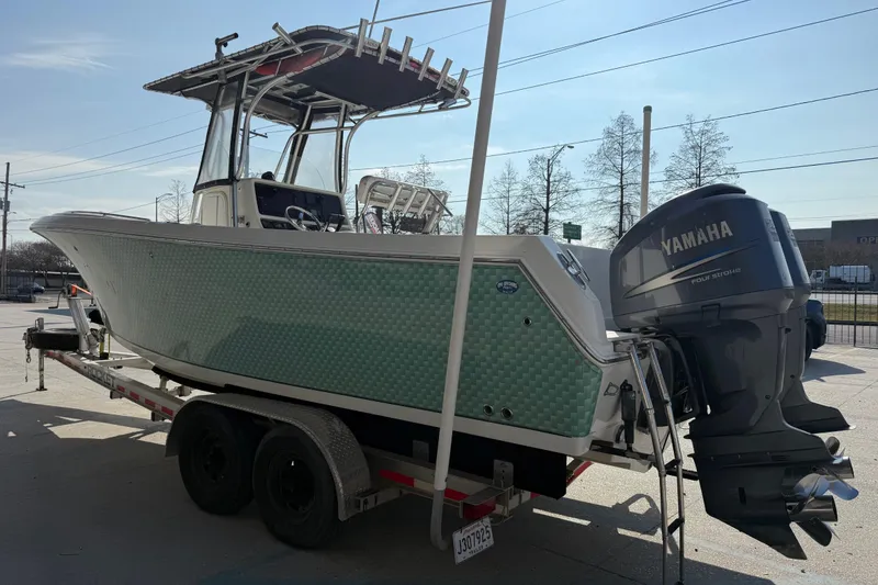 Slide: The Image of 2007 Sailfish 2660 CC boat with Yamaha outboard engine on trailer. - 4