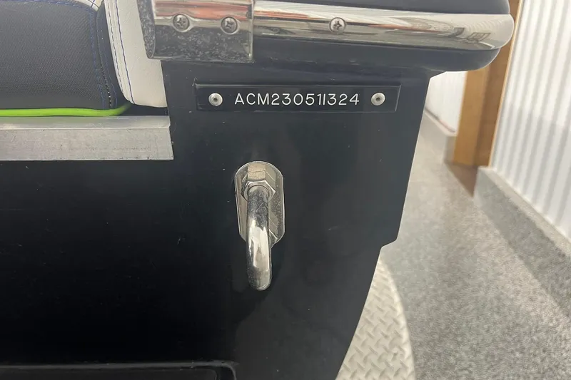 Slide: The Image of 2024 Action 23 Open boat detail with serial number ACM230511324. - 3