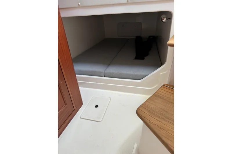 Slide: The Image of 2024 NorthCoast 285 HT helm with dual screens, steering wheel, and control panel. - 4