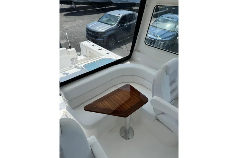 Slide: The Image of Interior of 2024 NorthCoast 285 HT boat with clean deck. - 6