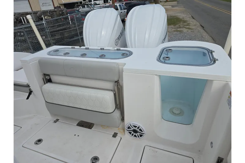 Slide: The Image of 2023 Sea Fox 288 Commander boat interior with seating and storage compartments. - 12