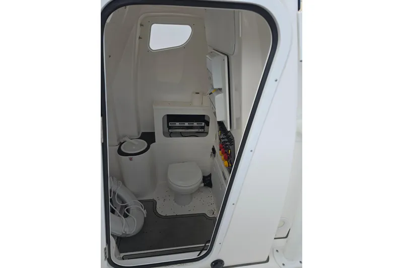 Slide: The Image of Interior view of 2023 Sea Fox 288 Commander boat's compact bathroom. - 20