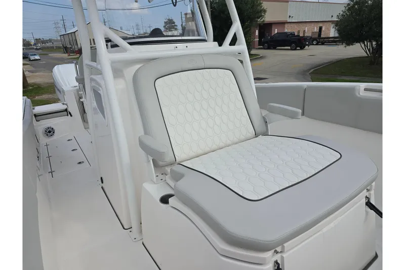 Slide: The Image of 2023 Sea Fox 288 Commander boat with white cushioned seating and sleek design. - 21