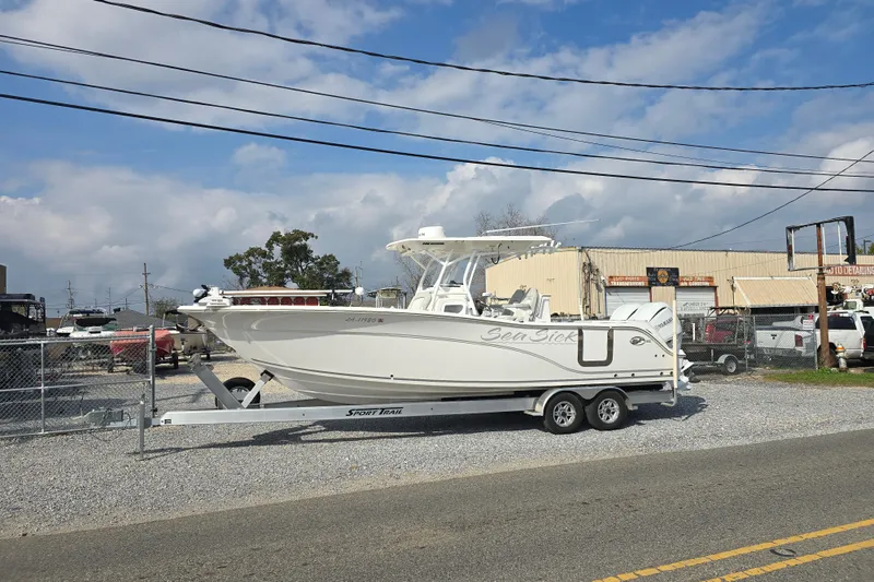 Slide: The Image of 2023 Sea Fox 288 Commander boat on trailer, side view. - 23