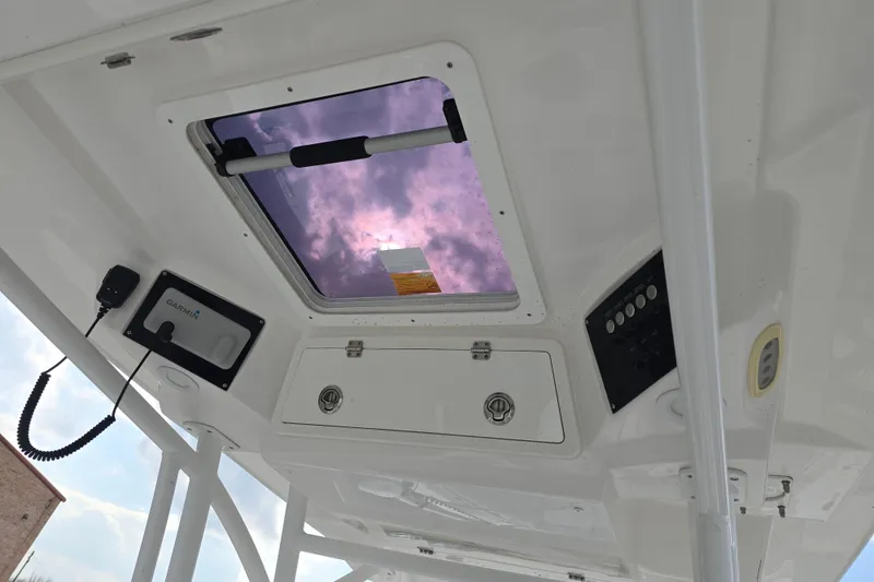 Slide: The Image of 2023 Sea Fox 288 Commander boat interior with hatch and control panel. - 24