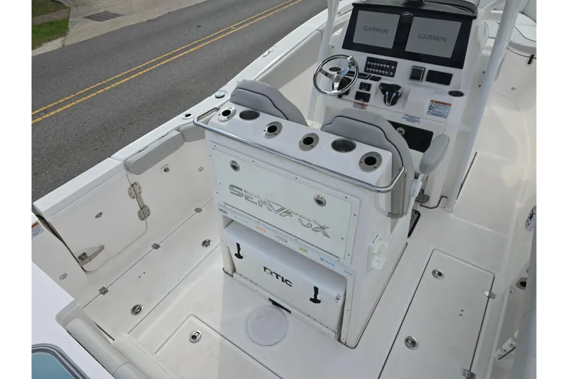 Slide: The Image of 2023 Sea Fox 288 Commander boat interior with dual Garmin displays and seating. - 25