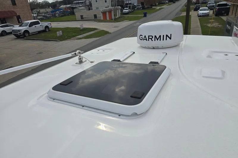 Slide: The Image of 2023 Sea Fox 288 Commander boat roof with Garmin equipment and hatch. - 26