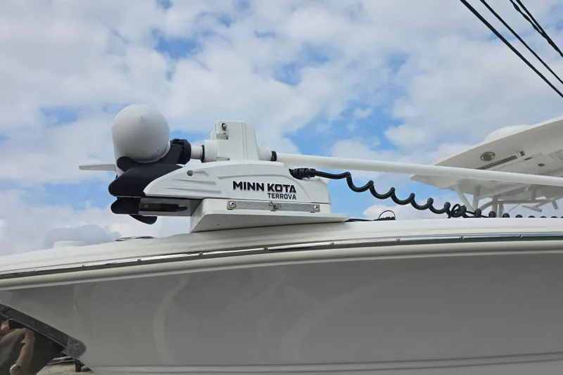 Slide: The Image of 2023 Sea Fox 288 Commander with Minn Kota Terrova trolling motor under cloudy sky. - 27