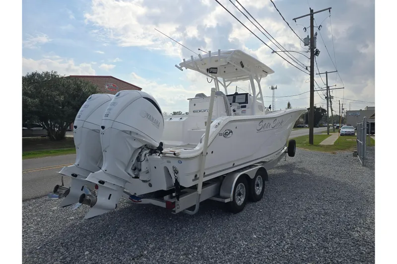 Slide: The Image of 2023 Sea Fox 288 Commander boat with twin Yamaha engines on a trailer. - 6