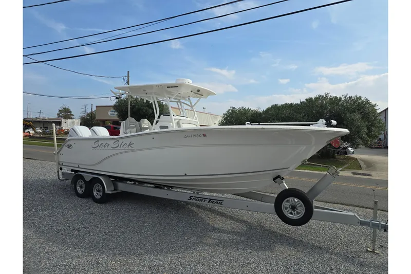 Slide: The Image of 2023 Sea Fox 288 Commander boat on trailer, parked outdoors. - 7