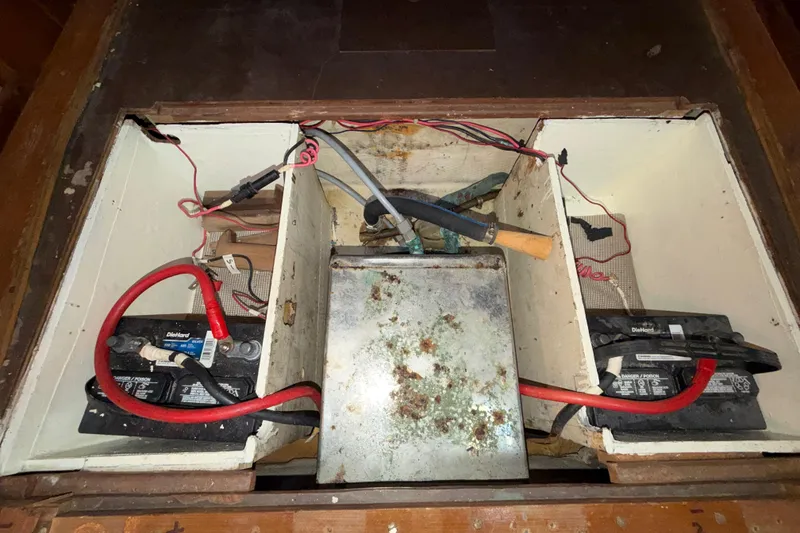 Slide: The Image of 1983 Morgan Catilina battery compartment with wiring and connections. - 100
