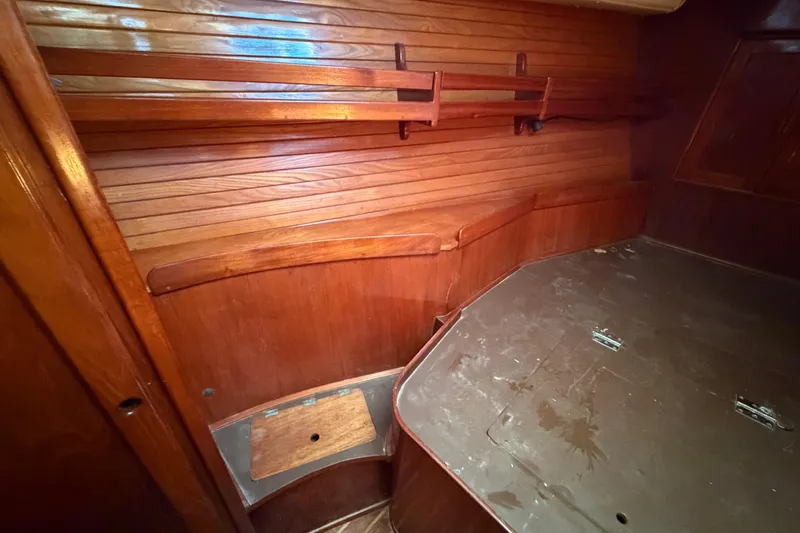 Slide: The Image of 1983 Morgan Catilina interior with wooden paneling and storage shelves. - 150
