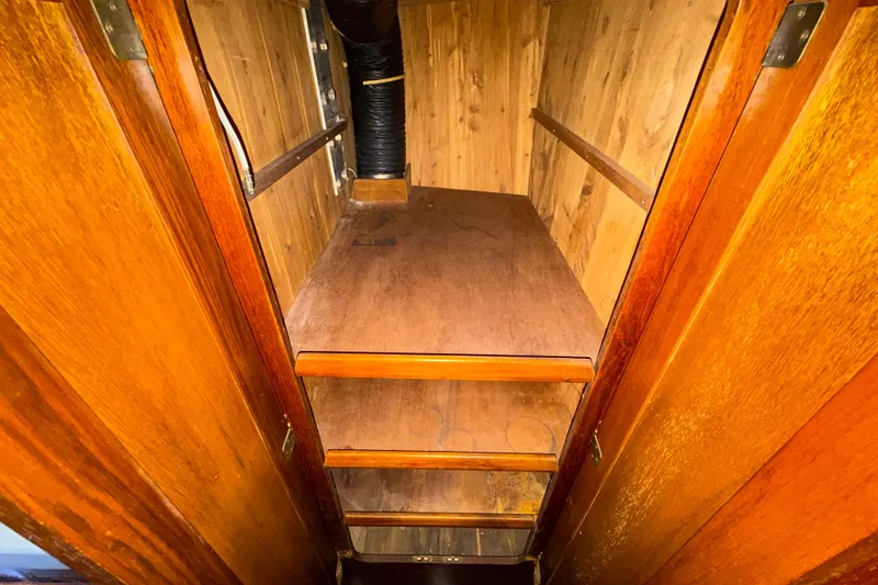 Slide: The Image of Wooden interior storage space in a 1983 Morgan Catilina boat. - 178