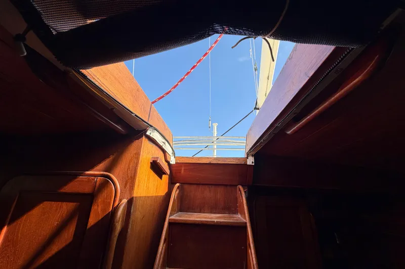Slide: The Image of Interior view of 1983 Morgan Catilina sailboat, looking up through the hatch to the sky. - 197