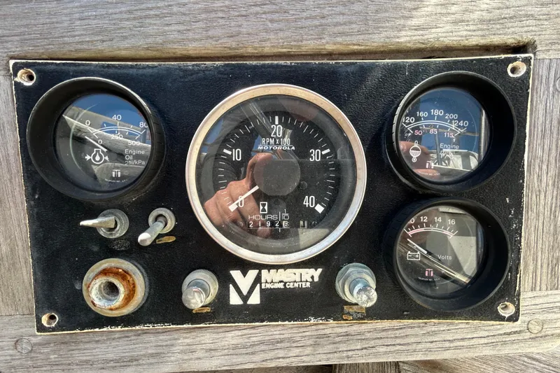 Slide: The Image of Dashboard of a 1983 Morgan 45 Catalina with engine gauges and controls. - 219