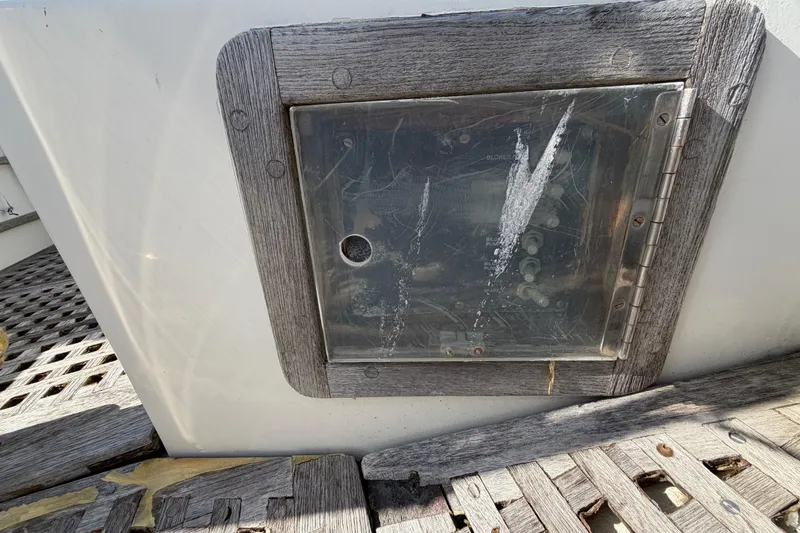 Slide: The Image of Weathered control panel on 1983 Morgan Catilina boat with wooden frame. - 25